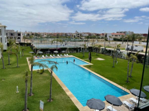 Bel appartement pied sur mer vue imprenable sur piscine et jardins